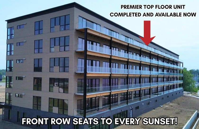 WATERFRONT, GYM, 28' BALCONY, GARAGE, SKYLIGHTS, TOP FLOOR, and - Beach Condo for sale in Muskegon, Michigan on Beachhouse.com