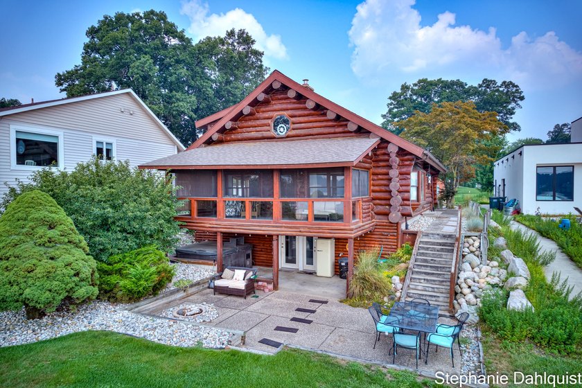 Experience the perfect blend of rustic charm and lakeside luxury - Beach Home for sale in Muskegon, Michigan on Beachhouse.com