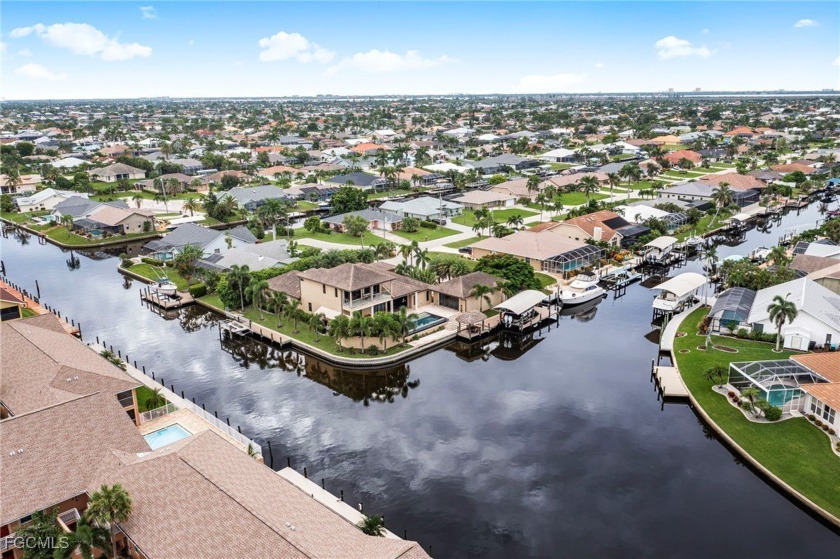 Welcome to Villa de Vern! This 2nd-floor Direct Gulf Access - Beach Condo for sale in Cape Coral, Florida on Beachhouse.com
