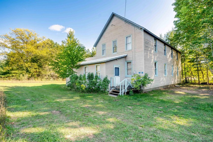 Unlock the ultimate Upper Peninsula adventure destination! The - Beach Lot for sale in Manistique, Michigan on Beachhouse.com