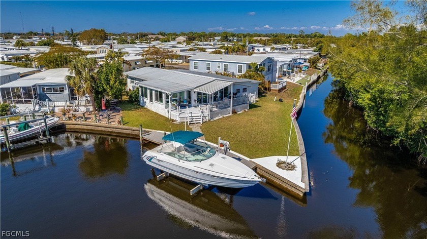 Beautifully furnished waterfront home situated on a corner lot - Beach Home for sale in North Fort Myers, Florida on Beachhouse.com