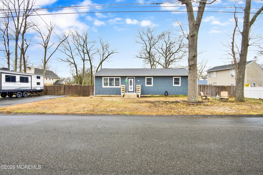 Welcome to this beautiful ranch perched on a generous, oversized - Beach Home for sale in Forked River, New Jersey on Beachhouse.com