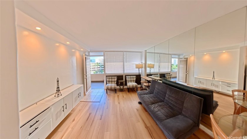 Enjoy a partial ocean view from this rare corner unit in a - Beach Condo for sale in Honolulu, Hawaii on Beachhouse.com