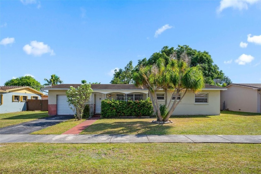 Welcome to this charming single-family home located in Palmetto - Beach Home for sale in Miami, Florida on Beachhouse.com