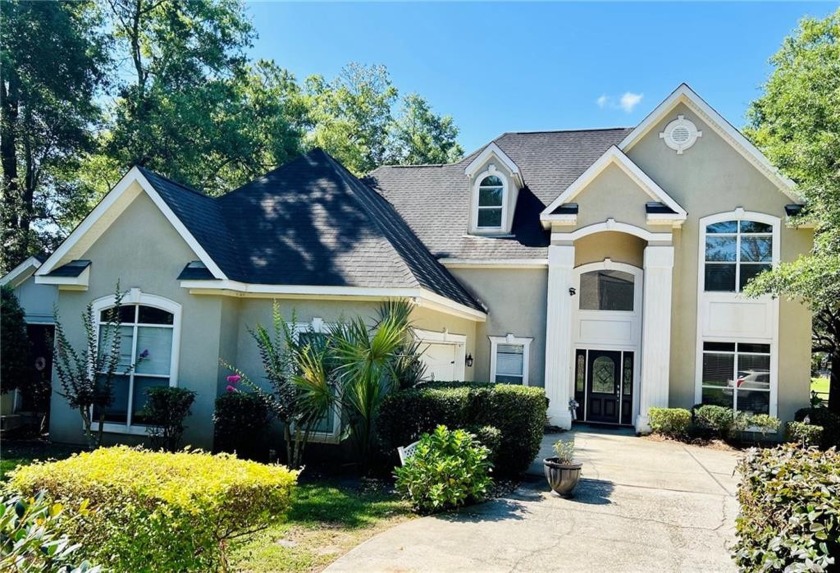 Custom built, one-owner home on 650 ft of a private lake. Only - Beach Home for sale in Mobile, Alabama on Beachhouse.com