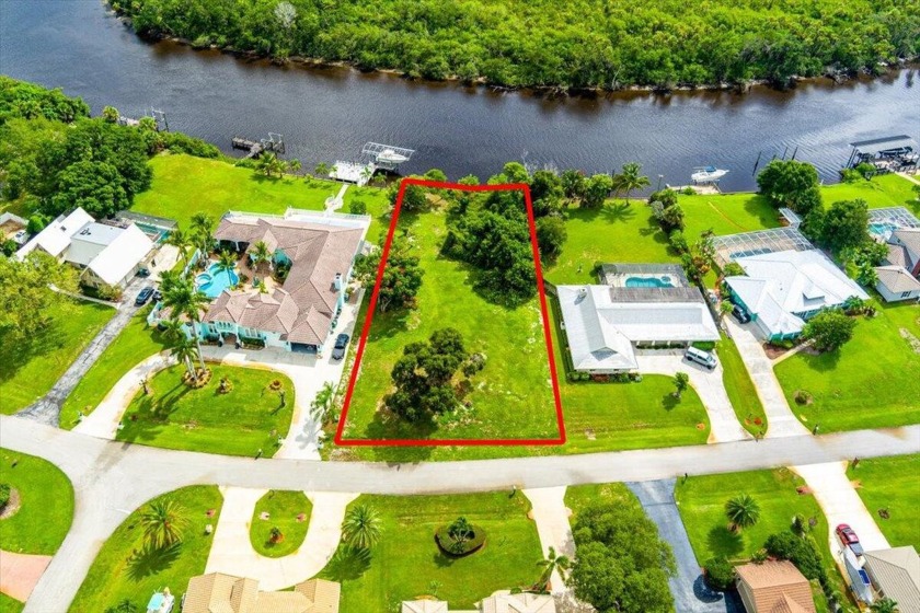 Embrace waterfront living with this rare .59-acre riverfront lot - Beach Lot for sale in Port Saint Lucie, Florida on Beachhouse.com
