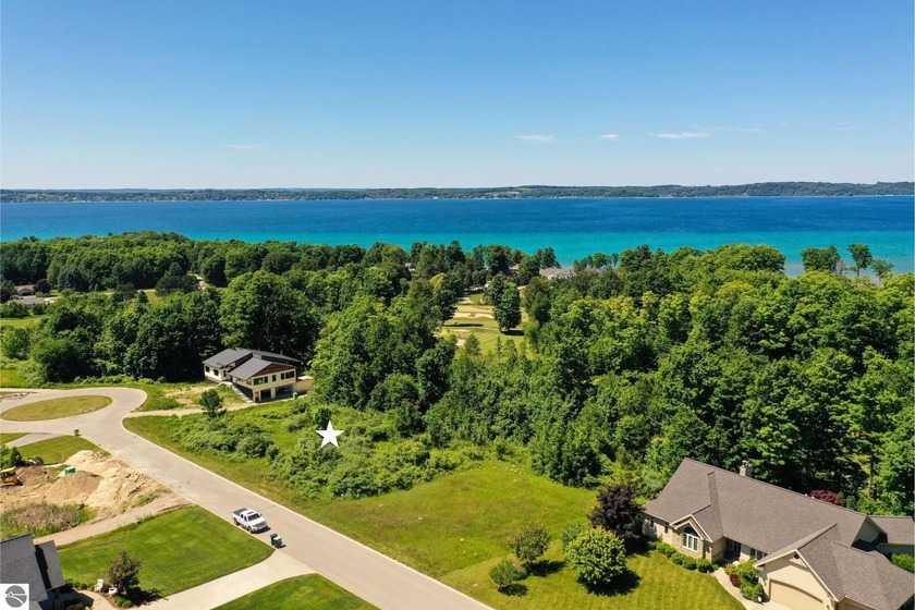 Build your dream home overlooking the 18th fairway at - Beach Lot for sale in Williamsburg, Michigan on Beachhouse.com