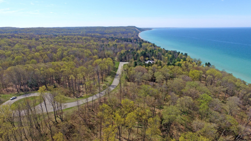 Stunning, wooded one acre lot with filtered views of Lake - Beach Lot for sale in Bear Lake, Michigan on Beachhouse.com