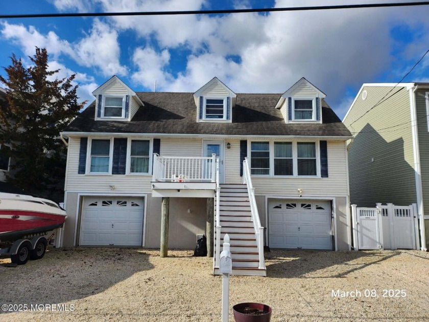 Experience waterfront luxury in this beautifully renovated - Beach Home for sale in Manahawkin, New Jersey on Beachhouse.com