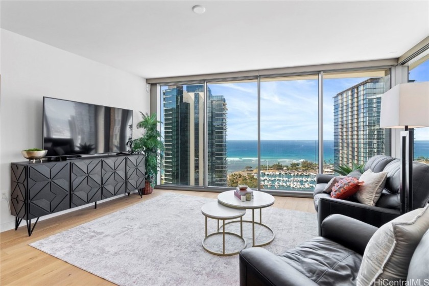 Come and see this 3-bed, 3-bath corner/end unit on the Makai - Beach Condo for sale in Honolulu, Hawaii on Beachhouse.com