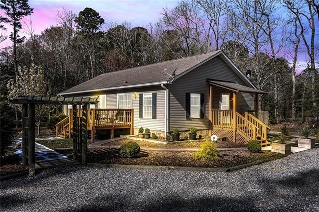 Over 4.25 Acres of privacy at this single level, low maintenance - Beach Home for sale in Burgess, Virginia on Beachhouse.com