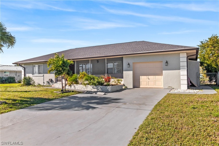 Waterfront pool home with dock and easy access to the open water - Beach Home for sale in Port Charlotte, Florida on Beachhouse.com