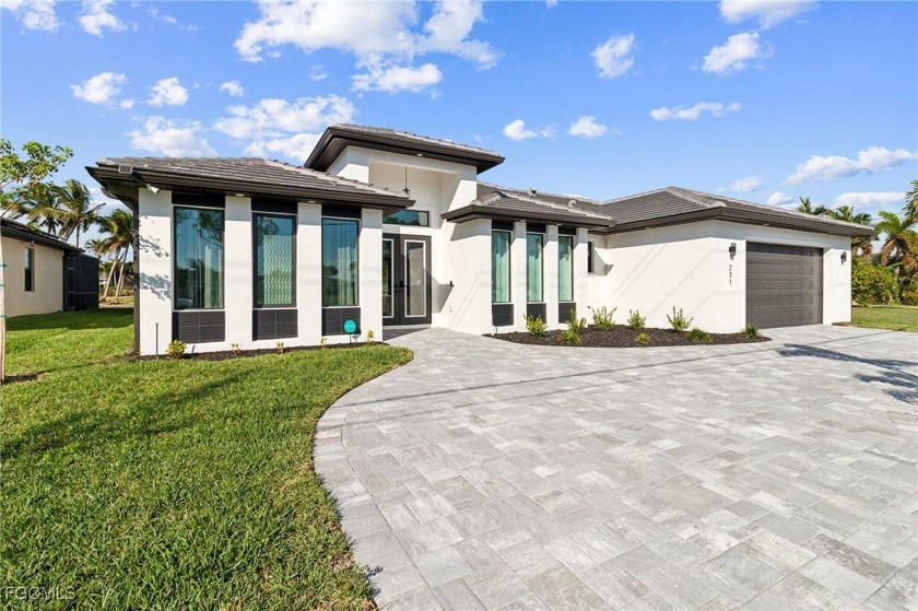 Welcome to your 2024 canal-front contemporary-an indoor/outdoor - Beach Home for sale in Cape Coral, Florida on Beachhouse.com