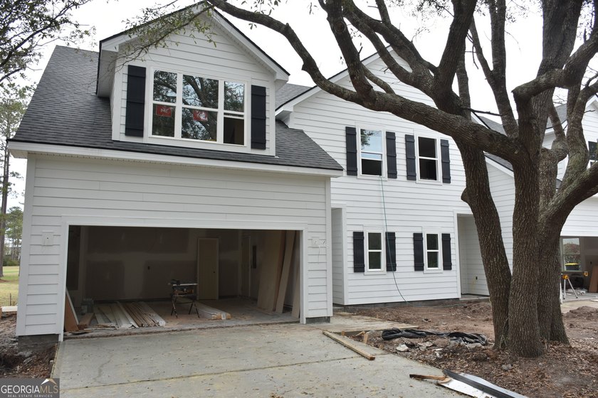 Experience coastal living at its finest in this beautiful new - Beach Townhome/Townhouse for sale in Townsend, Georgia on Beachhouse.com