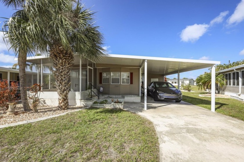This 1978 home on a premium interior lot is ready for your - Beach Home for sale in Port Charlotte, Florida on Beachhouse.com