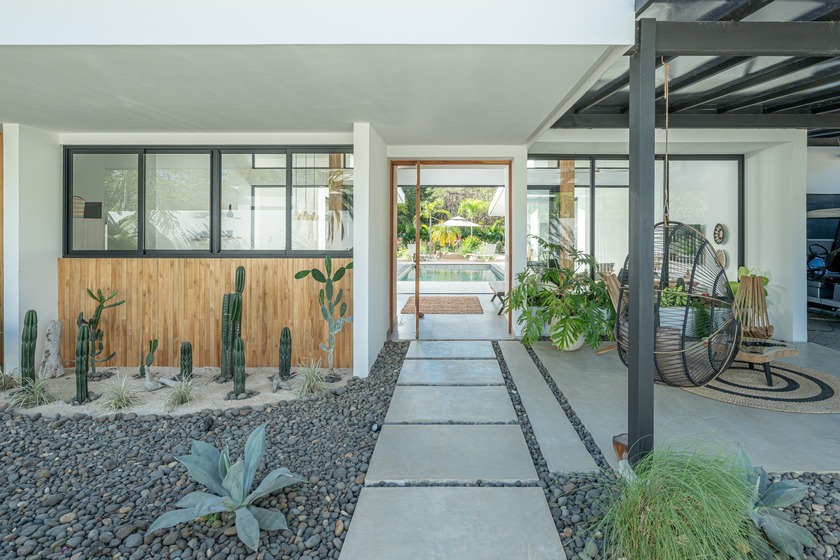 Vida Hermosa is a modern four-bedroom residence set within Playa - Beach Home for sale in Playa Grande,  on Beachhouse.com