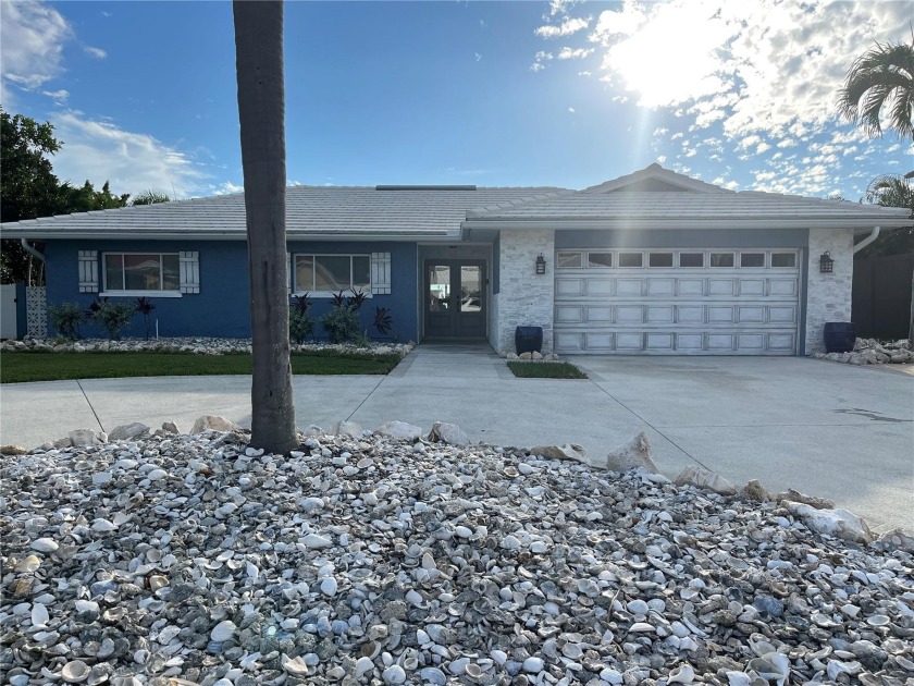 This exquisitely updated home is located in the most desired - Beach Home for sale in Treasure Island, Florida on Beachhouse.com
