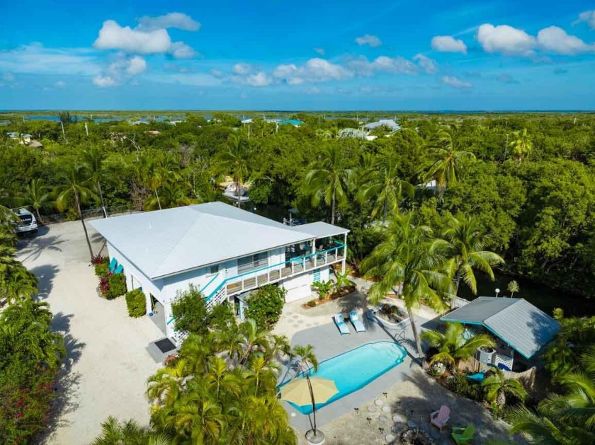 Privacy and tranquility abound at this exceptional Port Pine - Beach Home for sale in Big Pine Key, Florida on Beachhouse.com