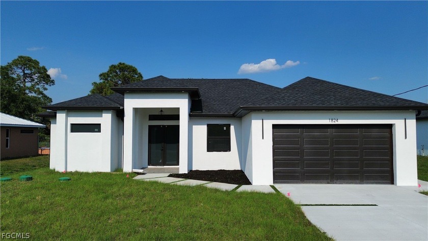 NEW CONSTRUCTION!! Fully impact doors and windows, gorgeous home - Beach Home for sale in Lehigh Acres, Florida on Beachhouse.com