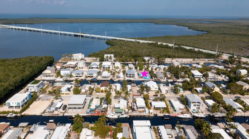 OPEN SUNDAY March 24 from 12-2pm! 60 feet on the water on a 55' - Beach Home for sale in Key Largo, Florida on Beachhouse.com