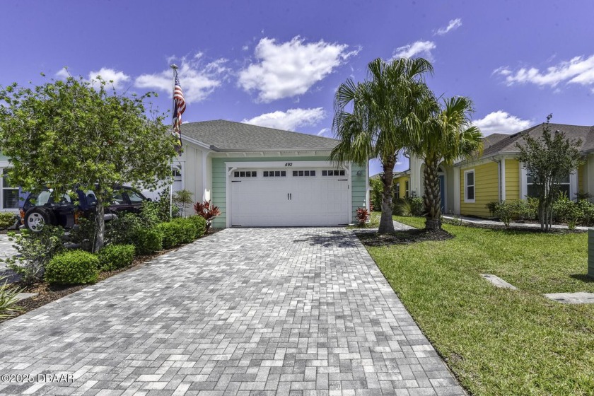 This STYLISH Jamaica Villa w/ custom paint & fireplace & wood - Beach Home for sale in Daytona Beach, Florida on Beachhouse.com