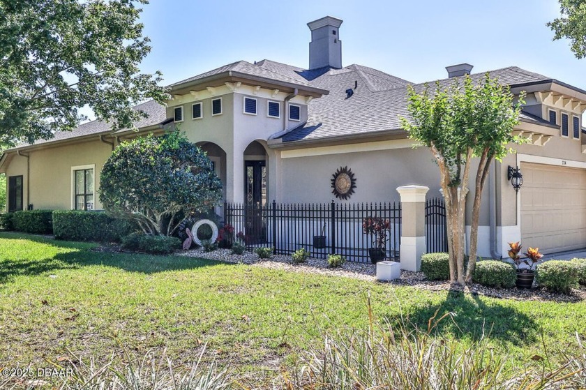 Rarely available one story end unit w/lake and fountain view in - Beach Home for sale in Ormond Beach, Florida on Beachhouse.com