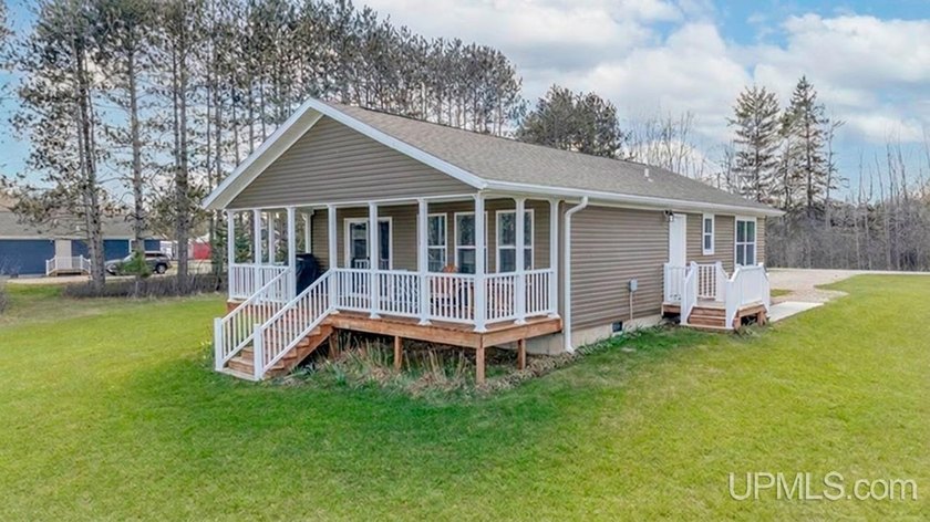 Just outside of Gladstone and Escanaba, this 2021-built - Beach Home for sale in Gladstone, Michigan on Beachhouse.com