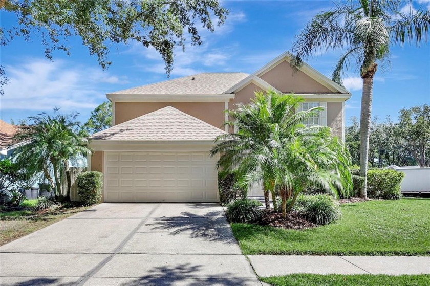 Welcome to this lovingly maintained 4-bedroom, 2.5-bath home on - Beach Home for sale in Tampa, Florida on Beachhouse.com