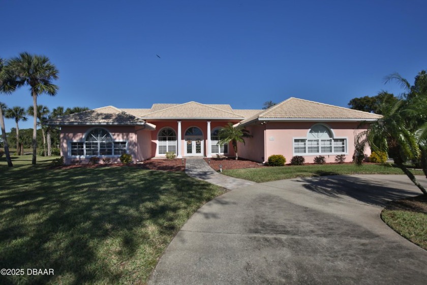 GATED COMMUNITY & True Floridian living at its finest. This ONE - Beach Home for sale in Daytona Beach, Florida on Beachhouse.com