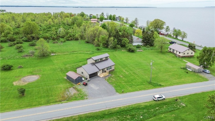 Come check out this amazing Waterview gem boasting 3 bedrooms, 2 - Beach Home for sale in Brownville, New York on Beachhouse.com