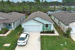 This MOVE- IN READY, LIKE NEW, WATERFRONT home, built in 2022 is - Beach Home for sale in Bunnell, Florida on Beachhouse.com