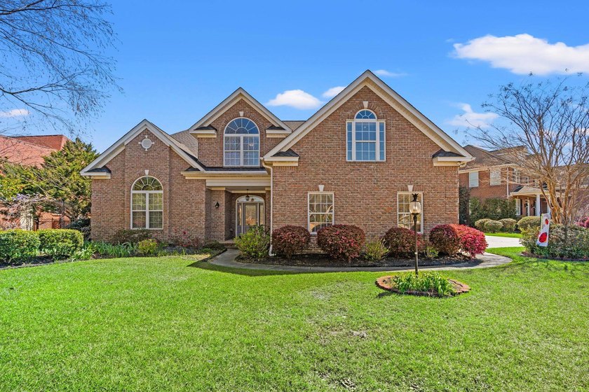 Nestled in a beautiful lakefront setting, this all-brick - Beach Home for sale in Myrtle Beach, South Carolina on Beachhouse.com
