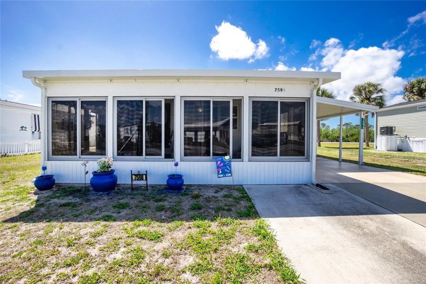 Welcome to the friendly WATERFRONT COMMUNITY, Village of Holiday - Beach Home for sale in Port Charlotte, Florida on Beachhouse.com