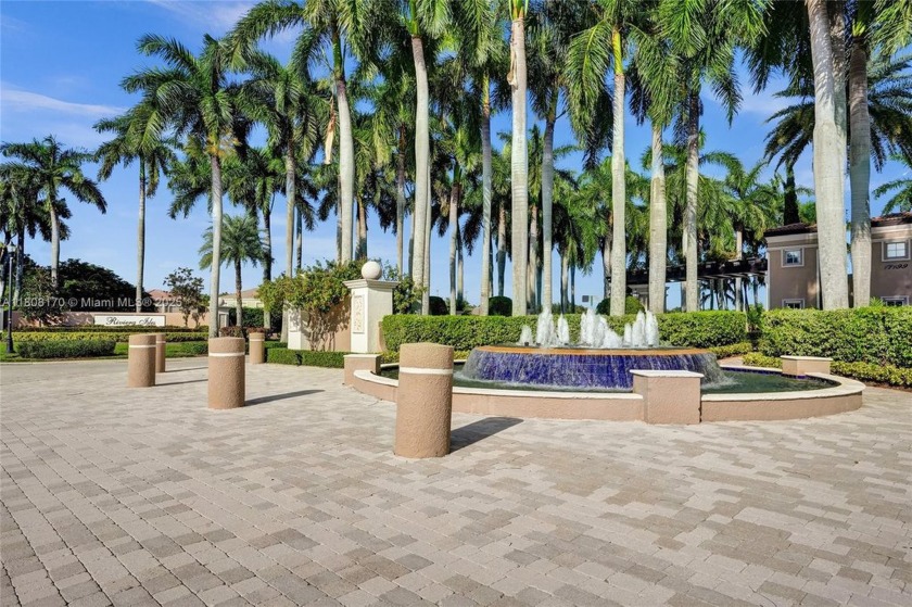 This exceptional 4-bedroom, 3-bath split-level home situated on - Beach Home for sale in Miramar, Florida on Beachhouse.com