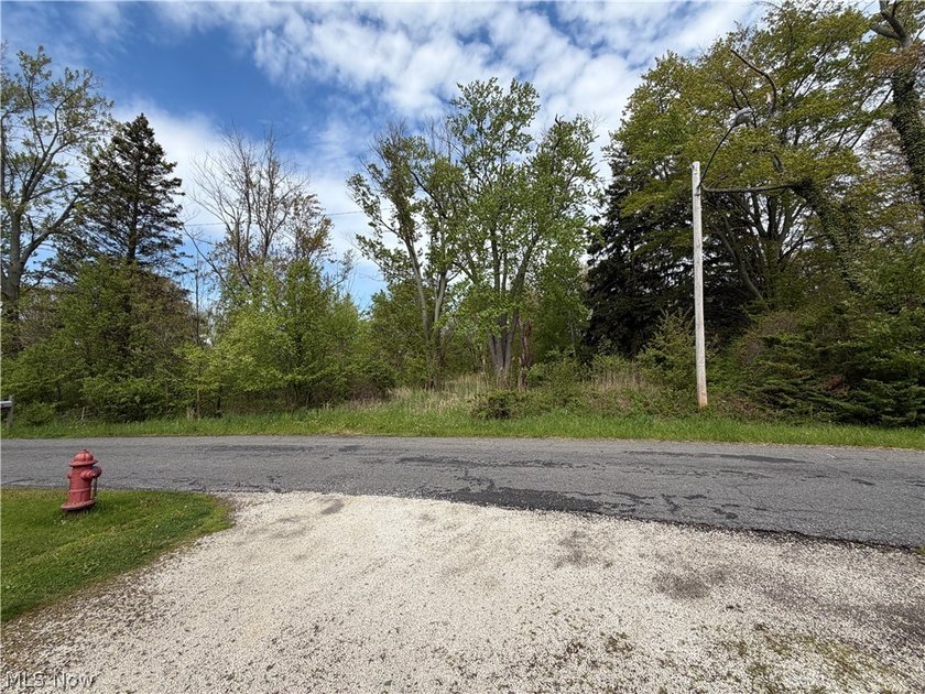 Discover the opportunity to create something truly special in - Beach Lot for sale in Madison, Ohio on Beachhouse.com