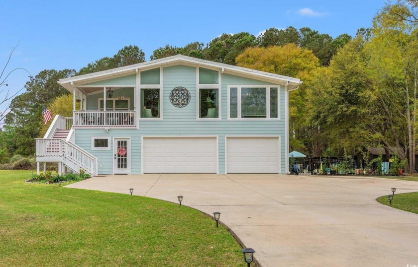 Experience your dream lifestyle in this exceptional raised - Beach Home for sale in Georgetown, South Carolina on Beachhouse.com