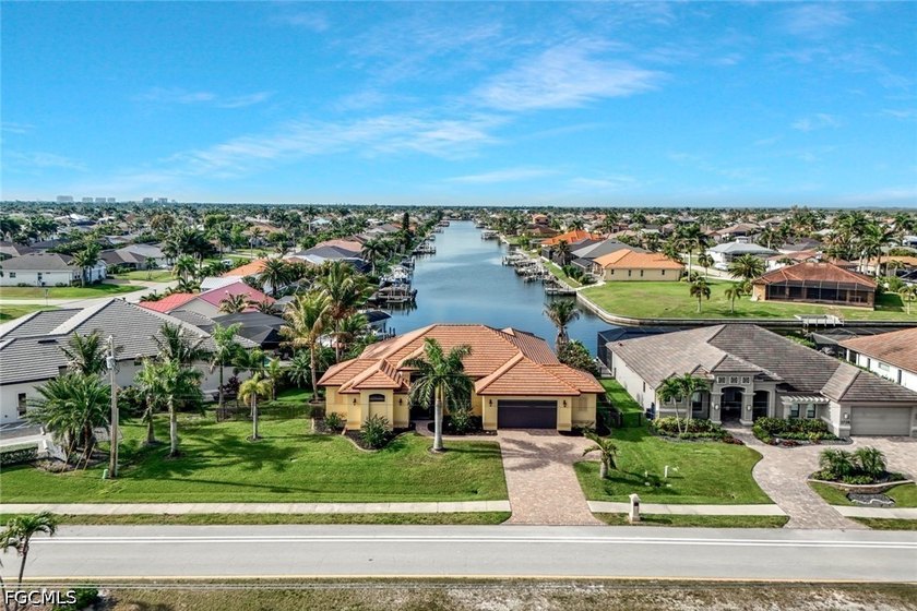 Welcome to your front-row seat to the ULTIMATE FLORIDA LIFESTYLE - Beach Home for sale in Cape Coral, Florida on Beachhouse.com