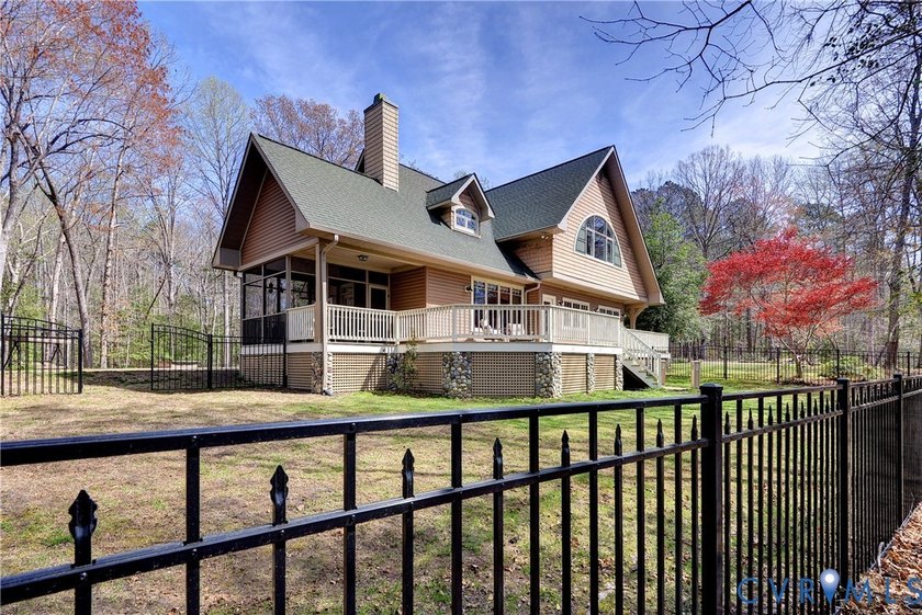 This home offers nearly 6 acres of privacy with serene pond - Beach Home for sale in Toano, Virginia on Beachhouse.com