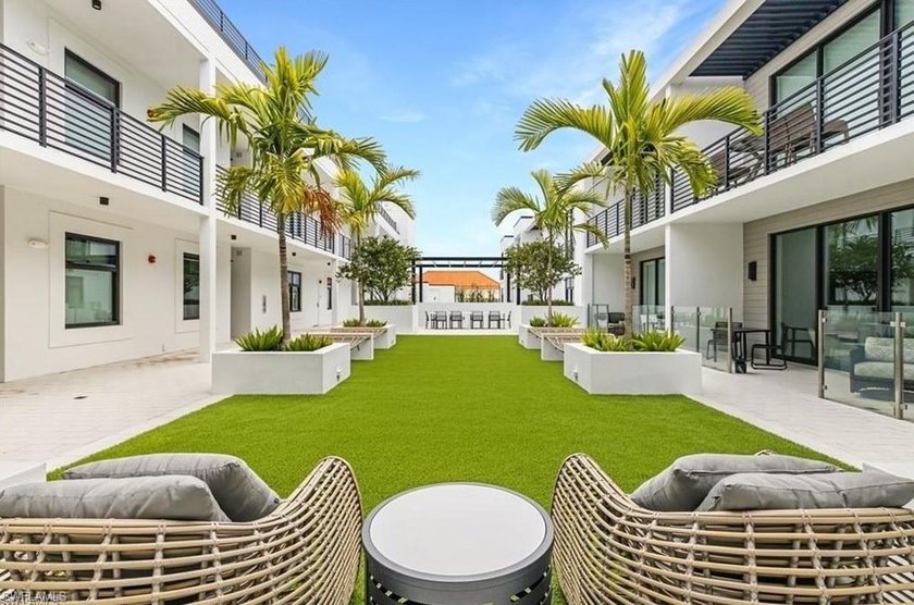 Experience the charm of Old Naples, situated just steps from 5th - Beach Condo for sale in Naples, Florida on Beachhouse.com