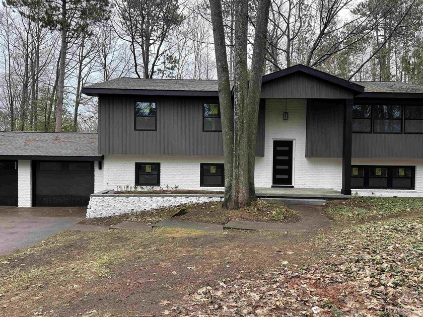 Step into a home where light, space, and design come together in - Beach Home for sale in Marquette, Michigan on Beachhouse.com