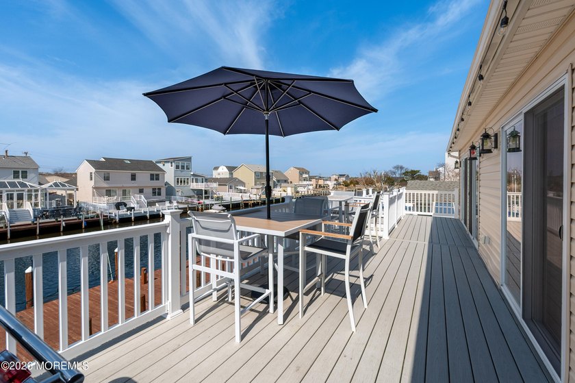 Whether spending the day on the water or entertaining by the - Beach Home for sale in Brick, New Jersey on Beachhouse.com