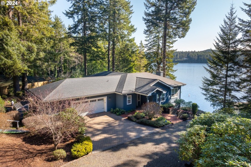 Experience lakefront luxury at its finest with this stunning - Beach Home for sale in Florence, Oregon on Beachhouse.com
