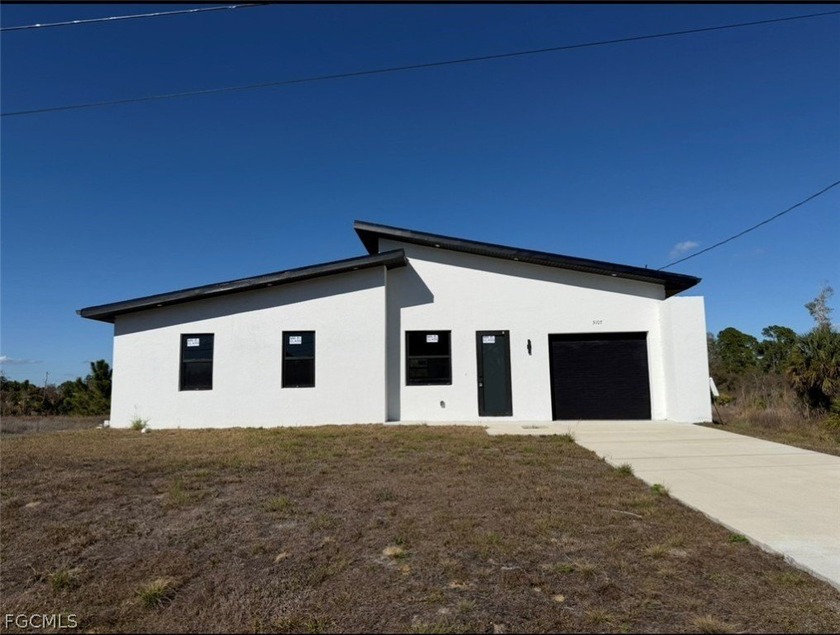 NEW CONSTRUCTION!! Fully impact doors and windows, gorgeous home - Beach Home for sale in Lehigh Acres, Florida on Beachhouse.com