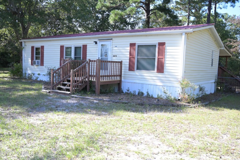 ATTENTION INVESTORS! 3 ADDITIONAL LOTS INCLUDED WITH THIS - Beach Home for sale in Shallotte, North Carolina on Beachhouse.com