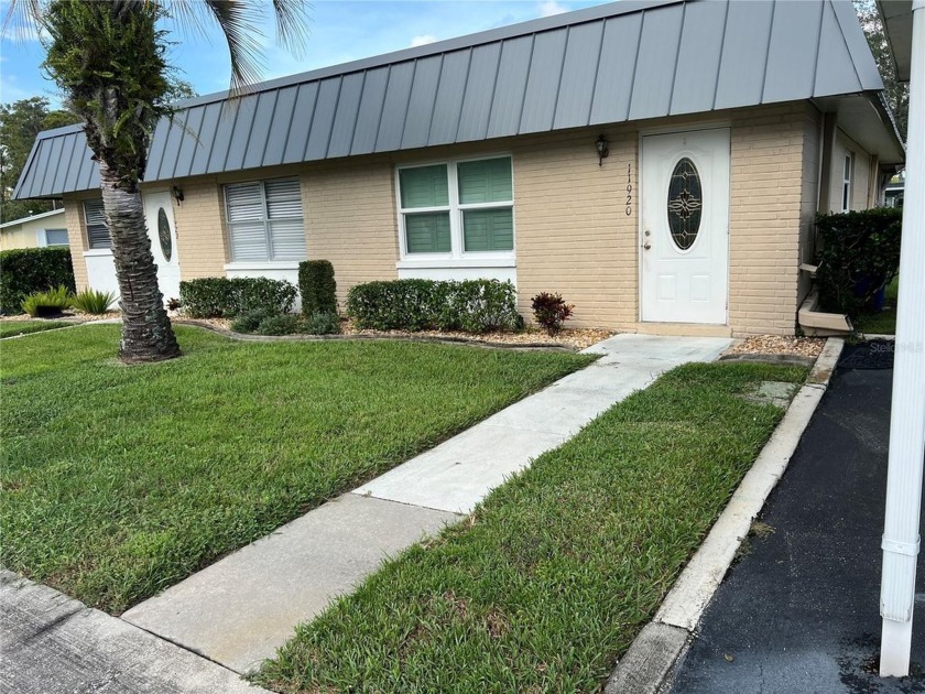 Roomy 1 bedroom 1.5 bath condominium located in Paradise Pointe - Beach Condo for sale in New Port Richey, Florida on Beachhouse.com