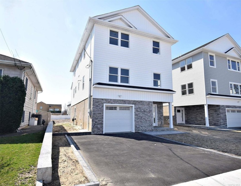 New construction 2024 two level Colonial Brick/Frame 1 Family at - Beach Home for sale in East Rockaway, New York on Beachhouse.com