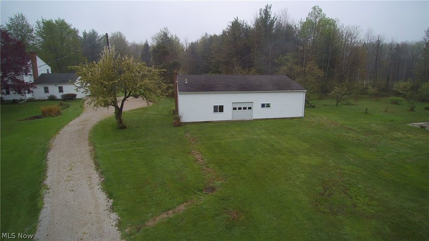 Country roads take you home to this warm, inviting four bedroom - Beach Home for sale in Geneva, Ohio on Beachhouse.com