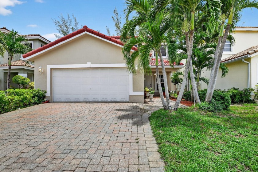 Welcome to this stunning two-story home located in the highly - Beach Home for sale in West Palm Beach, Florida on Beachhouse.com