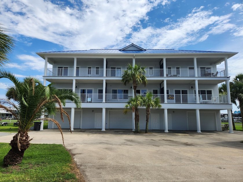 This 3bed/2.5bath condo was completely renovated in 2023 with ss - Beach Condo for sale in Grand Isle, Louisiana on Beachhouse.com