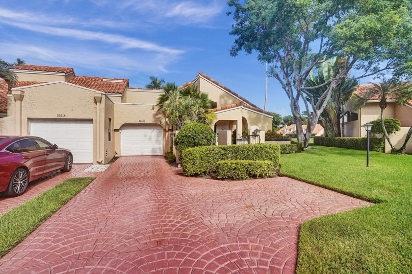 Beautiful corner lakefront villa located in the desirable gated - Beach Home for sale in Boca Raton, Florida on Beachhouse.com